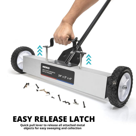 Person using 24 Inch Rolling Magnetic Floor Sweeper with 50 Pound Capacity and Adjustable Handle from 29 to 42 Inches for debris pickup.