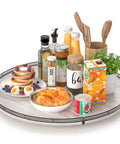 24 Inch Round Wooden Lazy Susan Turntable For Kitchen And Dining Room Organization with condiments and food items, whitewashed style.