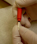Hand holding a combination handle for the Brush Plating Kit With 24K Gold Solution Complete Gold Plating System For Precise Finishes