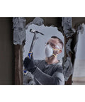 Person using 24 Oz Demolition Framing Hammer With Magnetic Nail Starter Delivers Powerful Nail Setting And Framing on drywall
