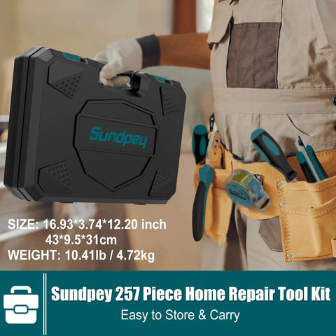 Close-up of a worker holding a black portable tool box labeled Sundpey 257 Piece DIY Ready Home Tool Kit For Household Repairs Complete Hand Tool Set With Wrenches Screwdrivers Sockets Ratchet Extension Bar Tape Level Tester Bits And Portable Storage Box In Blue.