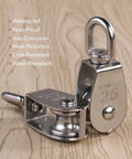 Two Pack 25mm 304 stainless steel pulley blocks with a 400 kg rating deliver reliable lifting, shown on a wooden surface.