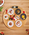 Top view of 26 Inch Bamboo Large Lazy Susan for Dining Table with dishes and wine, Natural Bamboo Turntable Top with Heavy Duty Metal Rotating Hardware