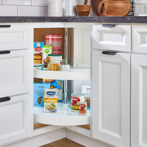 Pie-Cut Dual Tier Lazy Susan Organizer for Corner Base Cabinets in White Polymer with pantry items stored on shelves