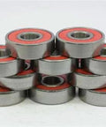 Stack of 28-Pack Flowboard Skate Ball Bearings with removable red seals, showcasing chrome steel design.