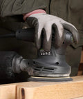 280W Orbital Sander 13000 RPM With Dust Collection And 15 Discs in use on wood surface
