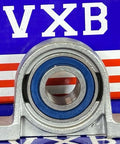 15mm Bore Miniature Stainless Steel Pillow Block Mounted Bearing displayed on a vibrant background.