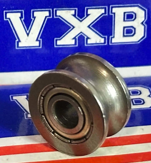 4mm Bore Bearing - 13mm Shielded Pulley U-Groove Track Roller 4x13x7mm displayed in front of VXB box