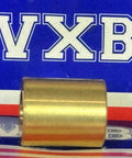 Side view of 3/8" x 5/8" x 3/4" inch Bearing Bronze Cast Bushing Plain Sleeve against colorful background.