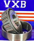 15101/15244 Tapered Roller Bearing 1" x 2.440" x 0.8125" inch, close-up of chrome steel cone and cup on branded packaging