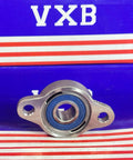 12mm Miniature Flanged Stainless Steel Mounted Bearing Block displayed against a blue VXB background.