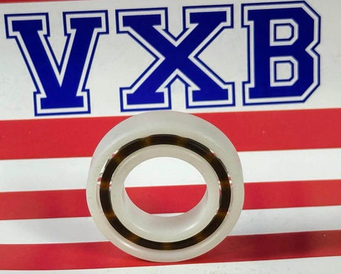 Front view of Acetal/POM Plastic Bearing 6904 with glass balls - 20x37x9mm, showcasing polymer raceway on branded background.