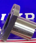 Side view of LMH12UU 12mm Flanged Ball Bushing CNC Linear Motion Bearing 12x21x30mm with square flange, highlighting metal surface.