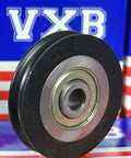 Front view of 6mm Bore Bearing - 39mm Wire Rope Cable Track Roller Pulley 6x39x8mm with nylon and rubber, against branded packaging