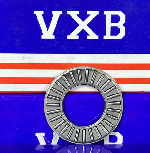 TC1427 Needle Roller Thrust Bearing in front of blue and red package