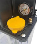 Close-up of 2L 110V Automatic Lubrication Pump with Dual Digital Display Gear Oiler showing oil cap and pressure gauge for CNC machinery.