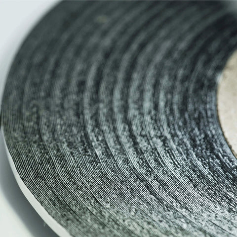 Close-up of 2mm double-sided adhesive tape roll for smartphone, tablet PC, and laptop LCD digitizer repair.