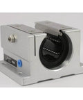 TWD12WUU NB 3/4" inch Ball Bushing Open Block Linear Motion, front view showing metal block and ball bearings for smooth motion and stability