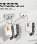 3-In-1 Removable Window Slot Brush With Hidden Scraper, orange and white, hanging on hooks for groove and track cleaning.