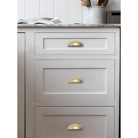 10 Pack 3 Inch Champagne Bronze Cup Drawer Pulls For Cabinets And Furniture Durable Solid Metal Kitchen Hardware installed on white drawers