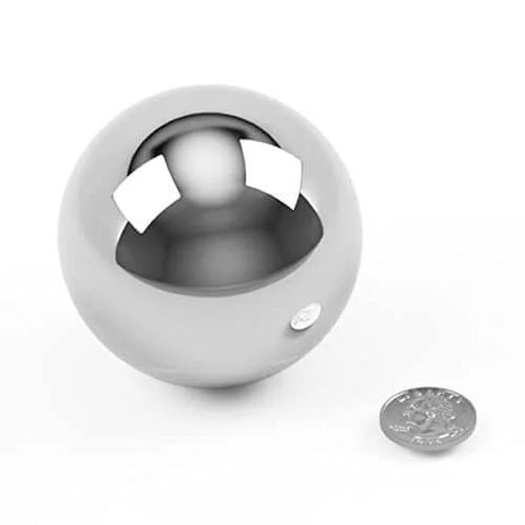 3 Inch Chrome Steel Ball Bearing G100 For Precision Machinery And DIY Projects next to a coin for size comparison