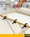Spring Clamps For Backdrop Stands And Tarps 3 Inch Jaw Clamps with 1.5 Inch Mouth Opening securing fabric to a table edge, 20 pack