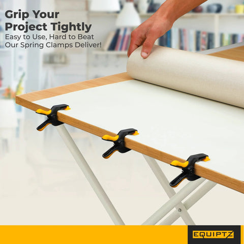 Spring Clamps For Backdrop Stands And Tarps 3 Inch Jaw Clamps with 1.5 Inch Mouth Opening securing fabric to a table edge, 20 pack