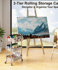 Khaki 3 Tier Metal Utility Rolling Cart With Lockable Wheels And Mesh Storage Baskets Your Go-To For Kitchen Office Living Room Laundry Garage And A Versatile Organizer For Snacks Tools Craft Supplies next to art canvas and easel