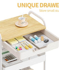 3-Tier Metal Rolling Cart With Wood Top And Drawer, White On Wheels, Multi-Purpose Storage Trolley; close-up of drawer with office supplies.