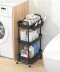 3 Tier Rolling Storage Cart With Lockable Wheels And Extra Hanging Cups For Kitchen, Bathroom, Living Room Or Office Black Heavy Duty Iron Frame, Sturdy Plastic Trays, Smooth Rolling, Easy Assembly By JIUYOTREE loaded with toiletries in bathroom