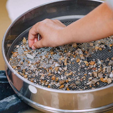 40 Mesh 0.45mm Lab Sieve 11.81 Inch Diameter 304 Stainless Steel Fine Mesh Screen being used for sifting stones and particles
