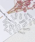 Thirteen Millimeter 304 Stainless Steel Spring Clip Hooks Rust Proof Lanyard Snap Clips Pack Of 50 displayed with dried flowers
