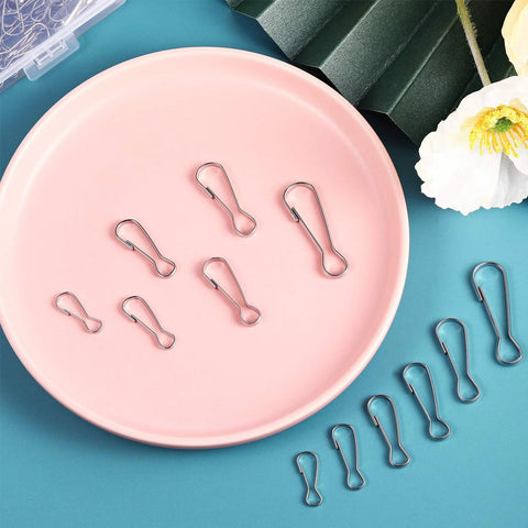 Premium 304 Stainless Steel Spring Hooks Set 250 Pieces in Six Sizes displayed on a pink plate