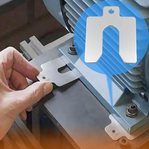 Hand installing a 304 stainless steel slotted shim from a 40 piece kit, with laser cut precision for auto machinery and cabinet work alignment.
