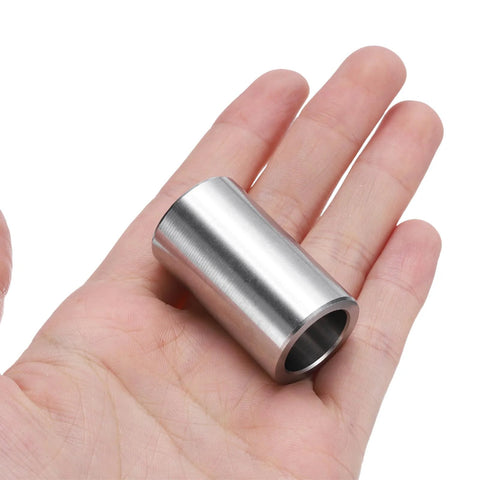 Hand holding a Stainless Steel Spacer 5/8 Bore 7/8 OD 1-1/2 Length, 304 stainless round metal standoff bushing plain finish.