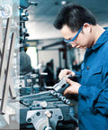 Six Piece Set Of 0.25 Inch By 0.25 Inch By 12 Inch 304 Stainless Steel Square Bar Key Stock shown with a machinist at work
