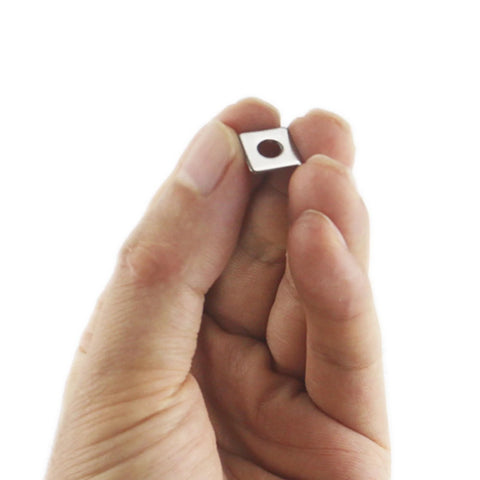 Hand holding 304 Stainless Steel M4 Square Plate Washer 10x10x1 mm, showcasing even load distribution and anti-rotation protection.