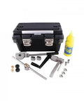 Front view of black waterjet tool kit case with metal tools, small parts and yellow lubricant bottle.