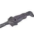 Close-up of a vintage cast iron wall-mounted hook, part of the Set Of 6 Wall Mounted Cast Iron Coat Hooks Retro Creative Rustic Hat Rack And Towel Hanger Strong Durable For Entryway Or Bedroom And Garden With Antique Badass Style.