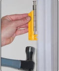 Pro Grade Door Hinge Pin Remover Tool For Stuck Pins With Heavy Duty Steel Pin And Durable Plastic Handle being used on door hinge