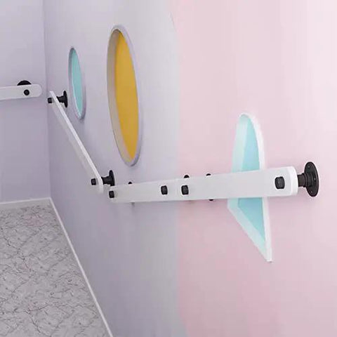 Rock Solid Pine Wood Stair Handrail Featuring Tight Non Slip Grip And Wall Mounted Safety Railing For Indoor Steps Built Tough For Seniors, white and black design on a colorful wall.