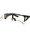 Super Lightweight Flip Over Radiation Safety Glasses Featuring Badass 0.12mm Lead Lens Protection With Comfy Rubber Grip Pads For Stress Free Medical Work, side view with clear lenses and black frame.