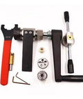 Waterjet coning and threading tool kit, front view with red and black handles and metal fittings