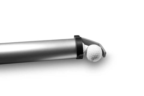 Close-up of Aluminum Shag Tube Golf Ball Shagger And Dispenser With Rubber Strap Updated Easy Pick End holding a golf ball