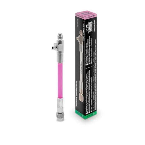 Front view of A/C leak-stop injector with pink tubing and metal fittings next to its packaging box.
