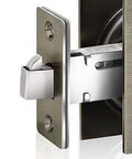 Close-up view of Privacy Pocket Door Lock And Pull In Stainless Steel 304 With Antique Brass Finish Emergency Unlock Feature