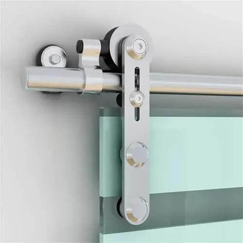 Close-up of Heavy Duty 12Ft Sliding Barn Door Hardware Kit With Stainless Steel Track System installed on a glass door