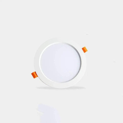 ELUKHT Recessed Lighting Housing Trim Kits Commercial Round White Ultra-Thin LED Recessed Downlight Aluminum embedded with orange clips.
