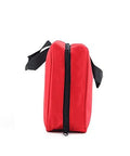 First aid bag in red fabric with black zipper and adjustable strap, side view.