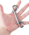 Hand holding 316 Stainless Steel Double Ended Bolt Snap Hook Marine Grade Diving Clips Heavy Duty Trigger Chain Clip Key Holder